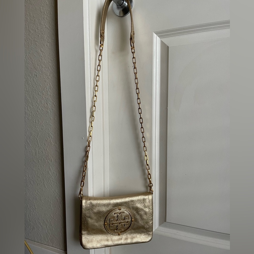 Gold Tory Burch crossbody bag clutch